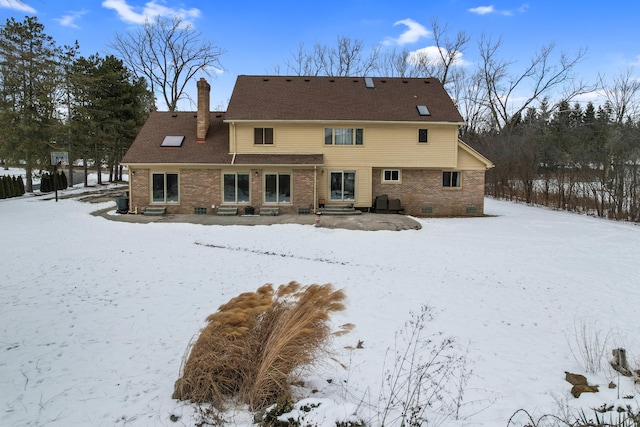 view of snow covered property