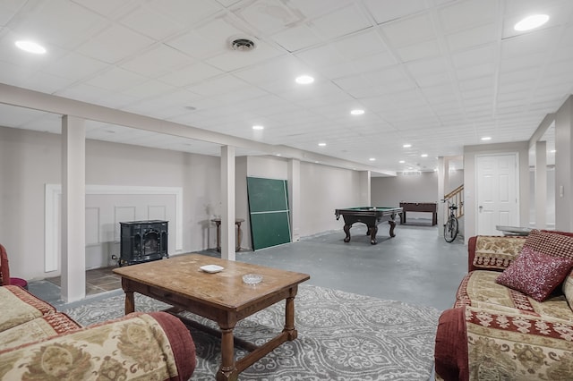 living room featuring pool table and concrete floors