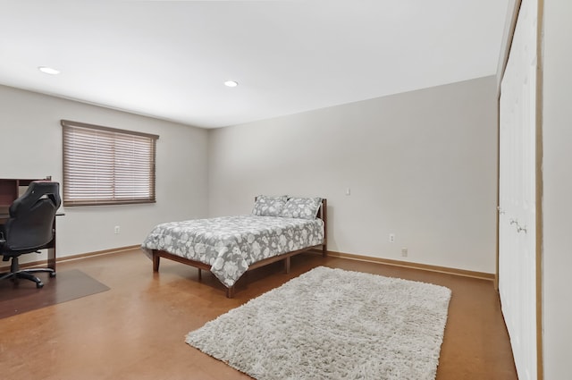 bedroom featuring recessed lighting and baseboards