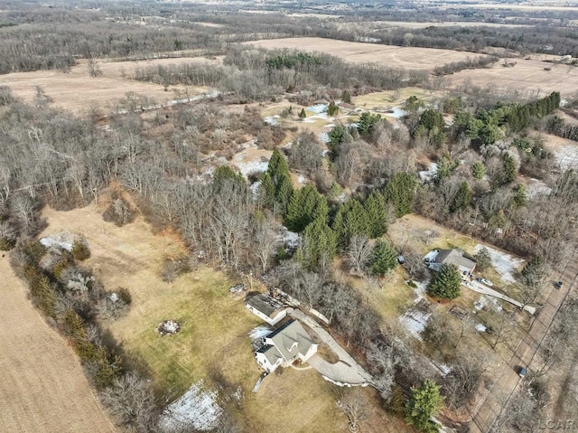 birds eye view of property with a rural view