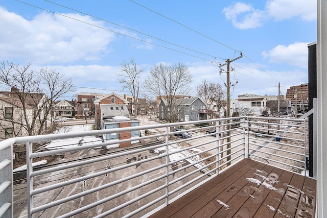 view of snow covered deck