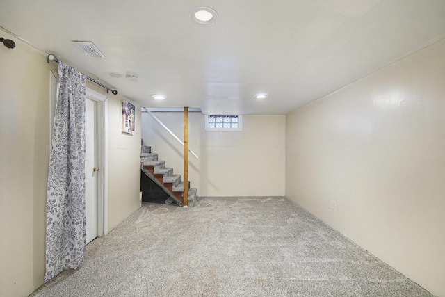 basement with carpet flooring