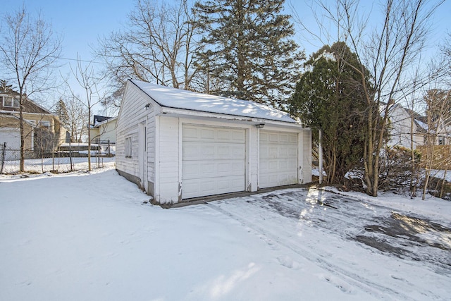 view of snow covered garage