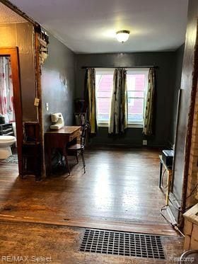 interior space with hardwood / wood-style flooring