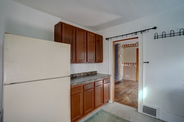 kitchen with white fridge