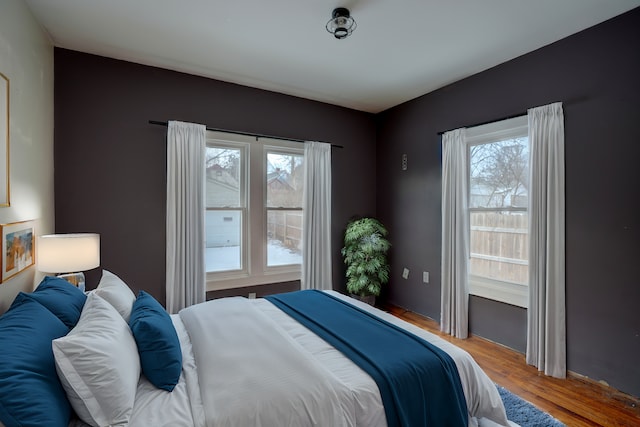 bedroom featuring hardwood / wood-style flooring