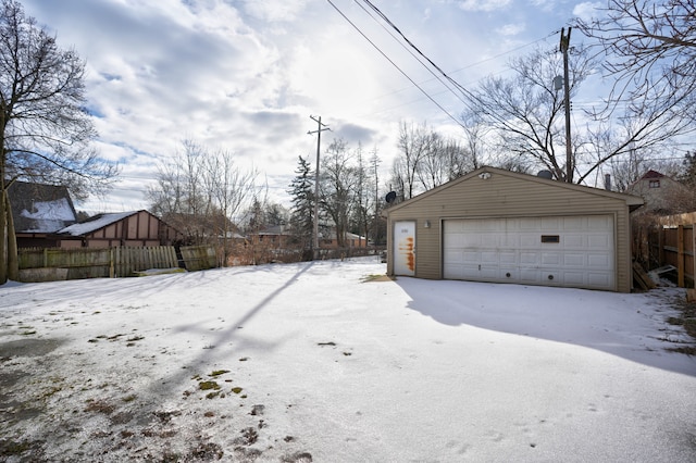 view of snow covered garage