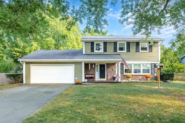 view of front of property with a garage, a front yard, and covered porch