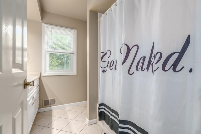 bathroom featuring vanity and tile patterned floors