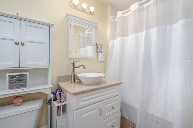 bathroom with vanity and toilet