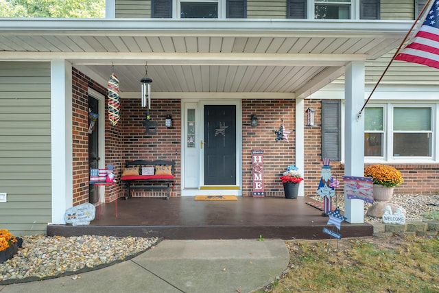 entrance to property with covered porch