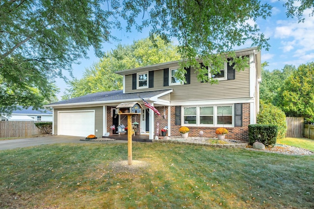 view of front property featuring a garage and a front lawn