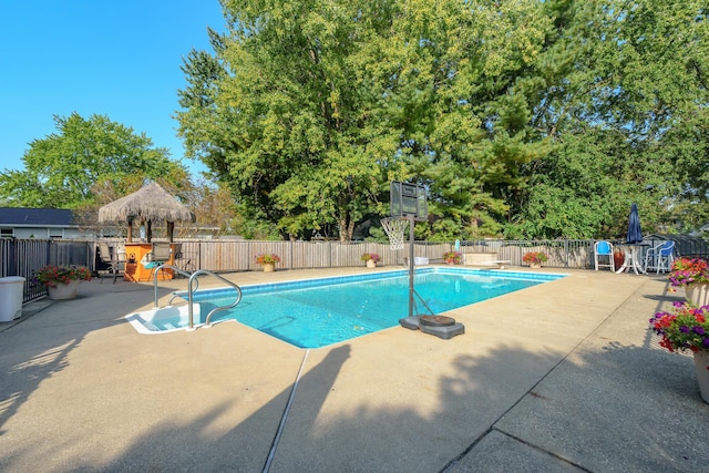 view of pool with a patio and a gazebo