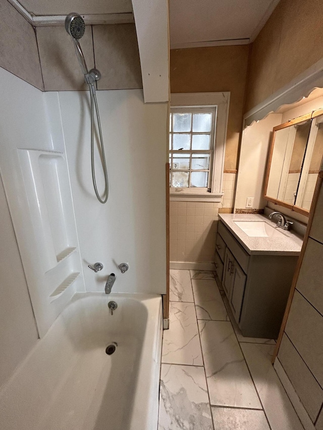 bathroom with vanity and shower / bathing tub combination