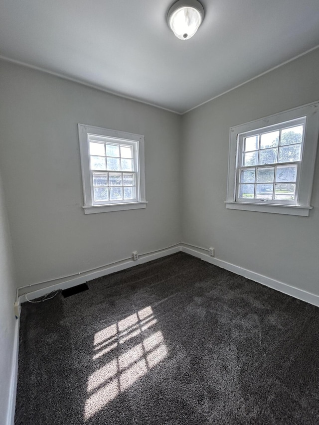 view of carpeted spare room