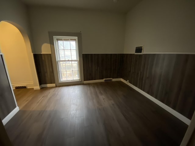 spare room featuring hardwood / wood-style flooring