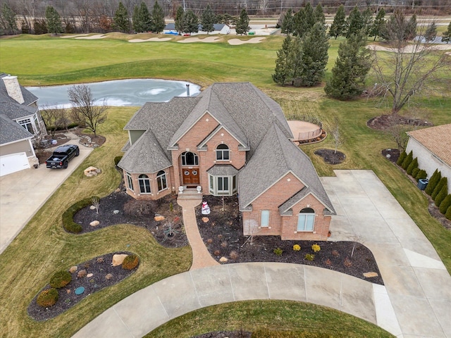 birds eye view of property with view of golf course