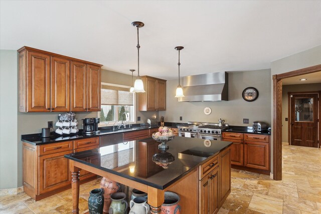 kitchen featuring a sink, appliances with stainless steel finishes, brown cabinetry, wall chimney exhaust hood, and open shelves