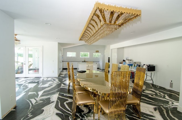 dining area with french doors and a healthy amount of sunlight