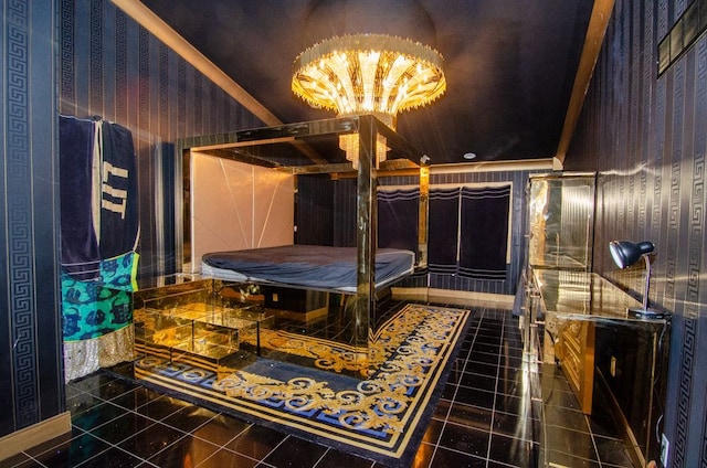 tiled bedroom featuring a notable chandelier