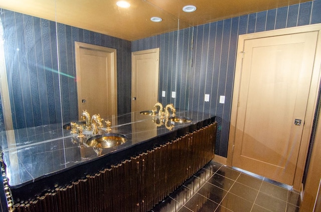 bathroom with tile patterned flooring and sink