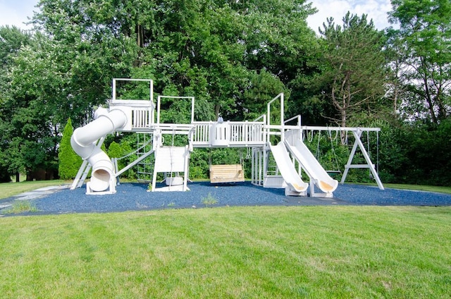 view of jungle gym with a lawn