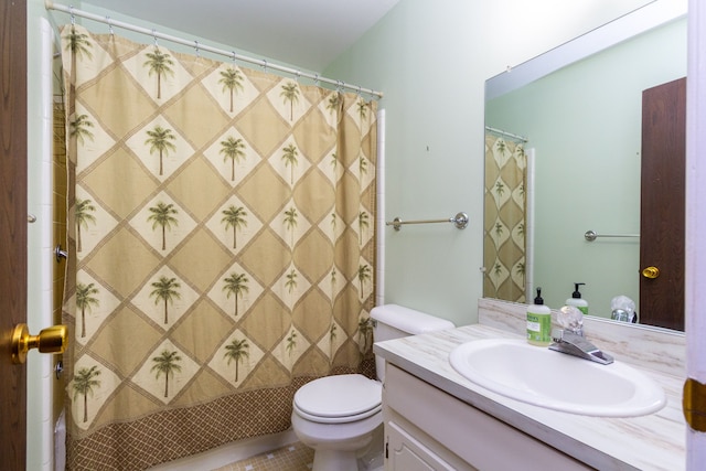 bathroom featuring vanity, toilet, and a shower with shower curtain