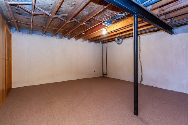 basement with carpet flooring