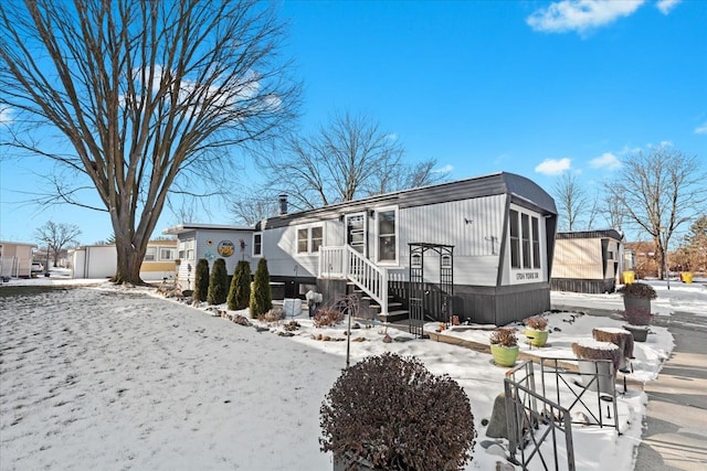 view of snow covered property