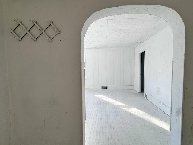 corridor featuring light hardwood / wood-style flooring