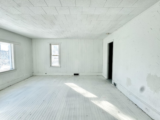 empty room featuring light hardwood / wood-style floors