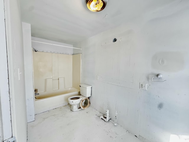 bathroom featuring toilet and bathing tub / shower combination