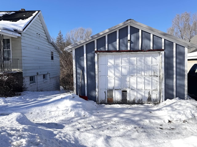 view of snow covered garage