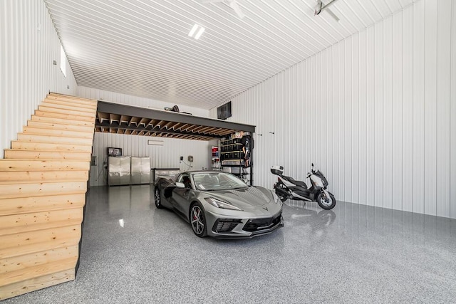 garage featuring a carport