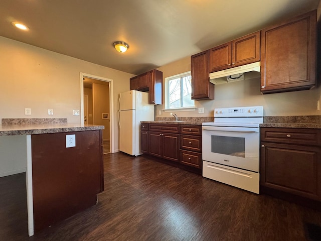 kitchen featuring sink, white appliances, and dark wood-type flooring