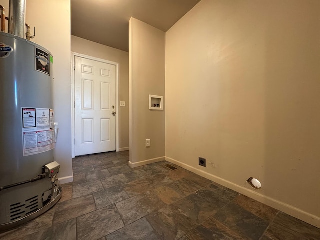 washroom featuring hookup for a washing machine, gas water heater, and hookup for an electric dryer