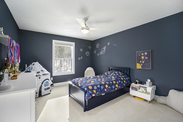 carpeted bedroom featuring ceiling fan