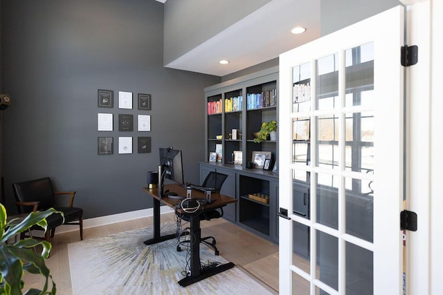 office with wood-type flooring