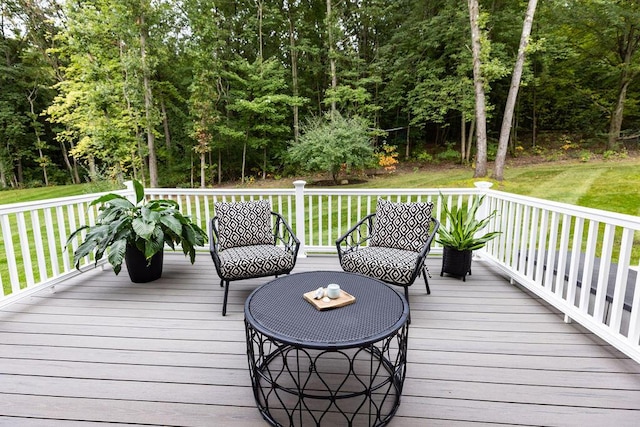 wooden deck with a yard