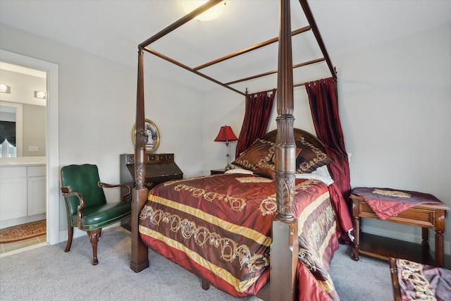 bedroom featuring light carpet