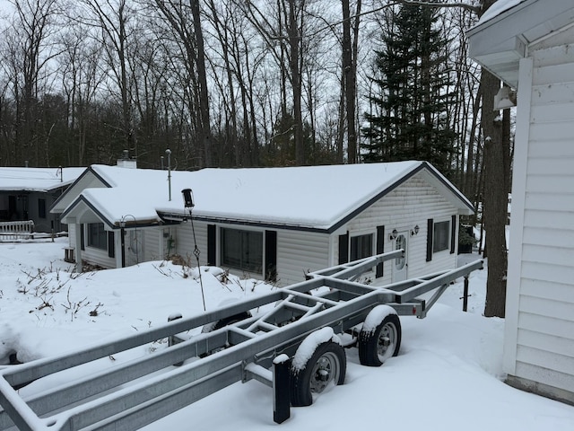 view of snow covered property