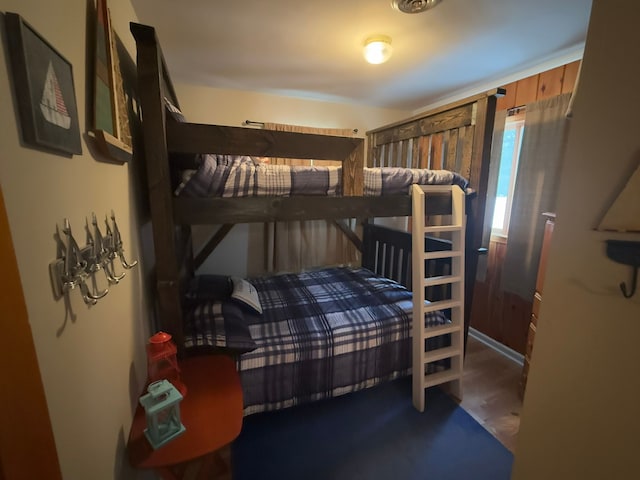 bedroom featuring dark hardwood / wood-style floors