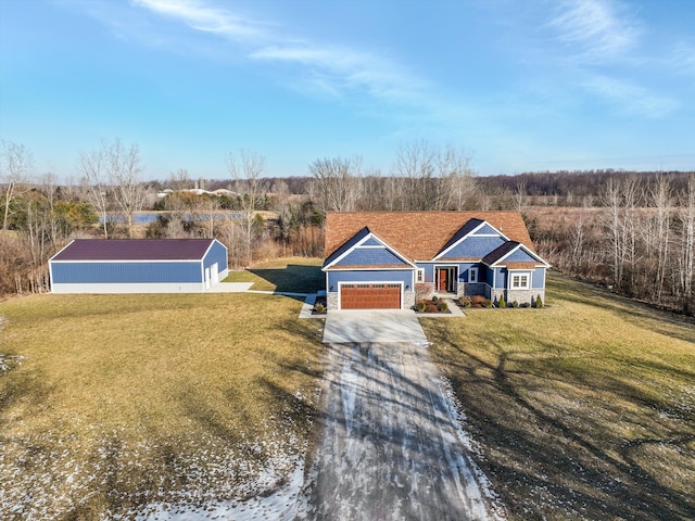 ranch-style home with a garage and a front lawn