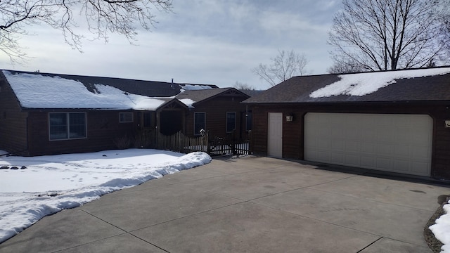 single story home with a garage