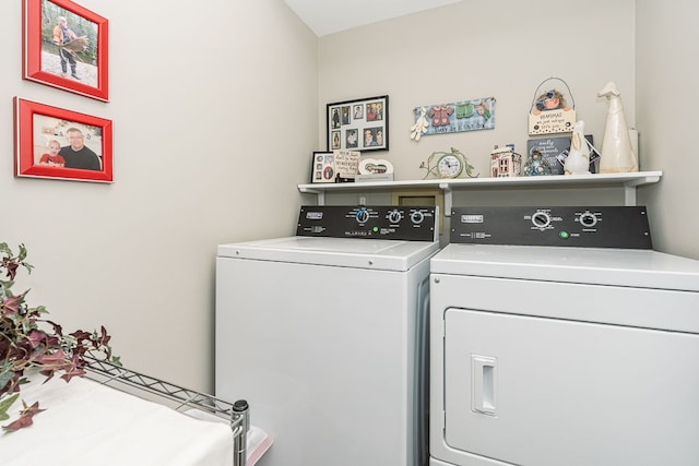 laundry area featuring washer and clothes dryer