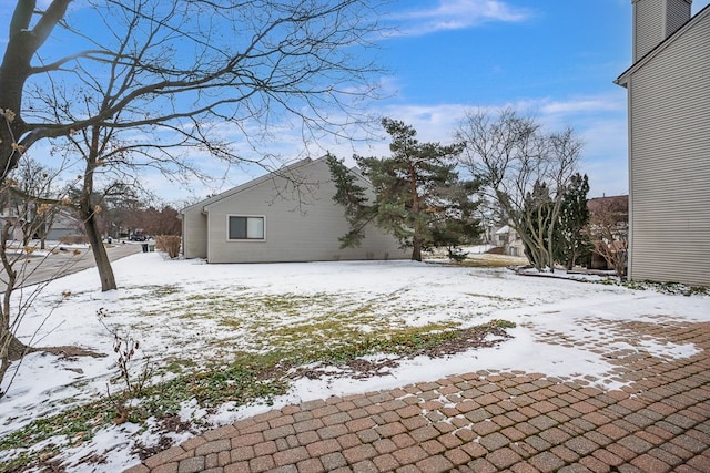 view of yard covered in snow