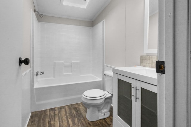 full bathroom with vanity, hardwood / wood-style flooring, tub / shower combination, and toilet