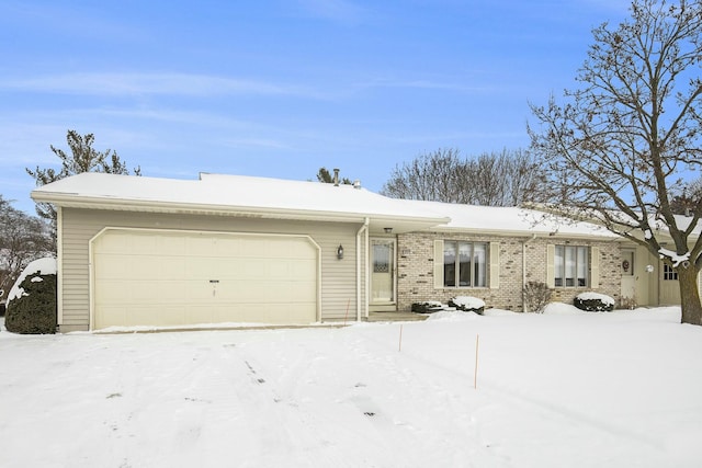 single story home featuring a garage