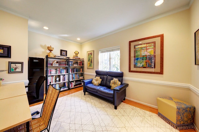 office space with ornamental molding and light hardwood / wood-style flooring