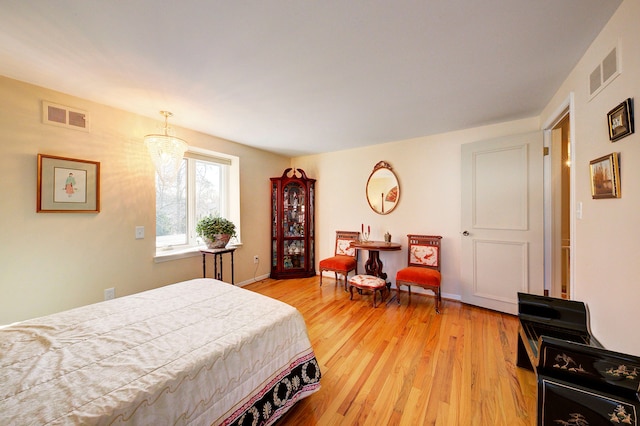 bedroom featuring light hardwood / wood-style floors